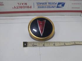2046257 Pontiac Bonneville Emblem Only Trunk Swing Lock Cover 1990-1991