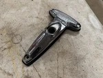 1949 Oldsmobile Trunk Lid Handle Bezel 4574379. Fixed Price $45.00.