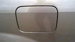 Protege 2000 Fuel Filler Door 1071828. Fixed Price $55.00.