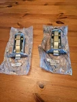Mercedes W123 Check Strap Pair 1237300016. Fixed Price $400.00.