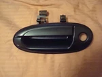 Nos '96 To '98 Taurus Sable Left Front Door Handle Willow Green F6DZ-5422405-H. Fixed Price $19.95.